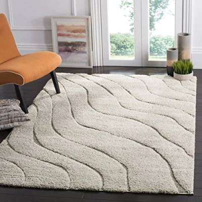 Obrázek SAFAVIEH Zottelig Teppich für Wohnzimmer, Esszimmer, Schlafzimmer Florida Shag Collection, Hoher Flor, Creme und Beige, 160 X 229 cm