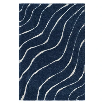 Obrázek SAFAVIEH Zottelig Teppich für Wohnzimmer, Esszimmer, Schlafzimmer Florida Shag Collection, Hoher Flor, Dunkelblau und Creme, 99 X 160 cm