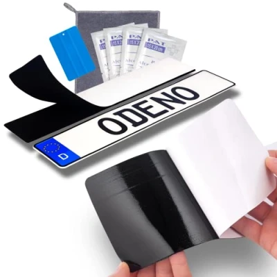 Obrázek Sada s držákem registrační značky bez rámečku, samolepicí upínací páska, 50 x 10 cm extrémně silné lepidlo odolné proti povětrnostním vlivům a suchý zip, černá