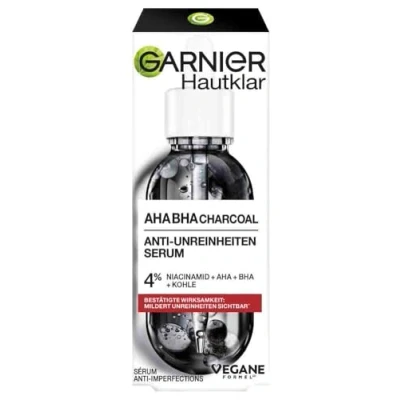 Obrázek Garnier Sérum AHA + BHA, kyselina salicylová, uhlí a 4% niacinamidové sérum, péče o obličej proti nečistotám, zmírňuje černé tečky viditelné, pro stejnoměrnou hebkou pokožku, čistá pleť, 30 ml