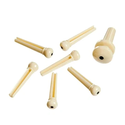 Obrázek Planet Waves PWSP12 7 plastové svorky na most + plast koncovka slonová kost s černou vložkou