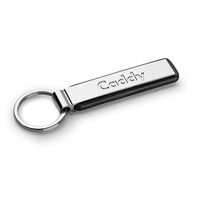 Obrázek Volkswagen 000087010MYPN přívěsek na klíče Caddy nápis Keyring kov originál VW přívěsek, stříbrný