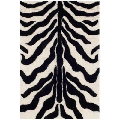 Obrázek SAFAVIEH Zebra koberec do obývacího pokoje, jídelny, ložnice Cambridge Collection, krátká vlas, slonovina a černá, 91 x 152 cm