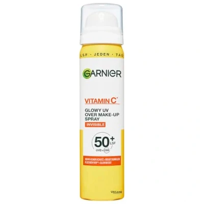 Obrázek Garnier Vitamin C* Glowy UV Over make up Spray LSF 50+ transparentní sprej na obličej s vysokou ochranou proti slunci a vitaminem pro více než up, 75 ml