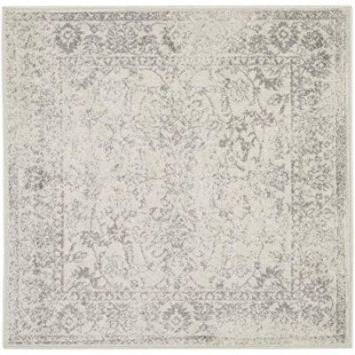 Obrázek SAFAVIEH Distressed Teppich für Wohnzimmer, Esszimmer, Schlafzimmer Adirondack Collection, Kurzer Flor, Elfenbein und Silber, 120 X cm
