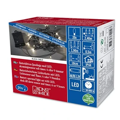 Obrázek Konstsmide 3722 100 LED světelný řetěz / pro venkovní použití (IP44) provoz na baterie: 4xAA 1,5 V (bez něj) se světelným senzorem, časovač 6 h a 9 20 diod černý kabel, teplá bílá