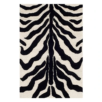 Obrázek SAFAVIEH Zebra koberec do obývacího pokoje, jídelny, ložnice Cambridge Collection, krátká předsíň, slonovinová a černá, 76 X 244 cm